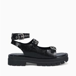 Novus black shoes with silver straps, never worn, size US 7